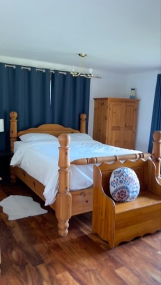 Tidy bedroom with fresh linens
